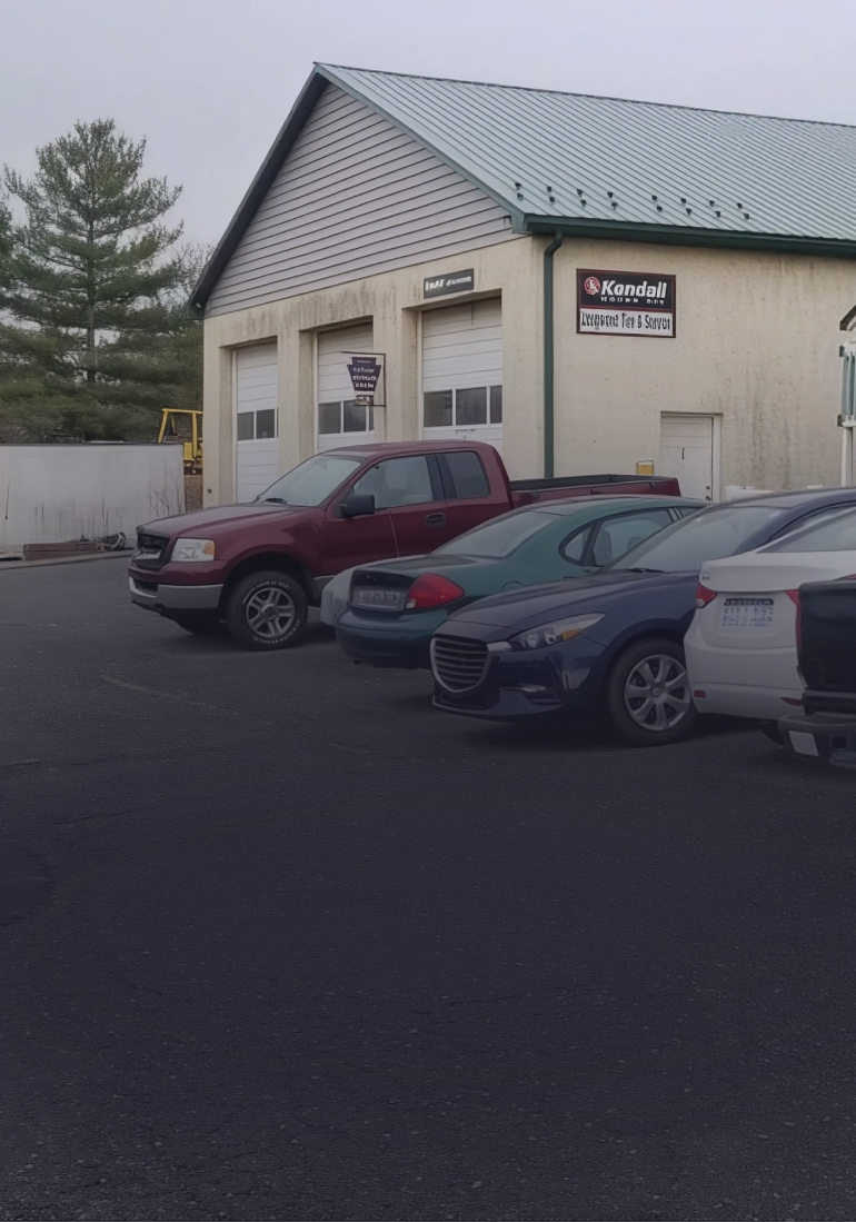 Cars parked in front of the shop | Longwood Tire & Service LLC