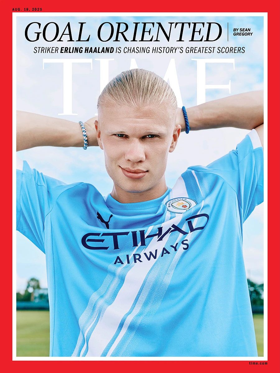 Erling Haaland on Time magazine cover, in a light blue soccer jersey, hands behind head.