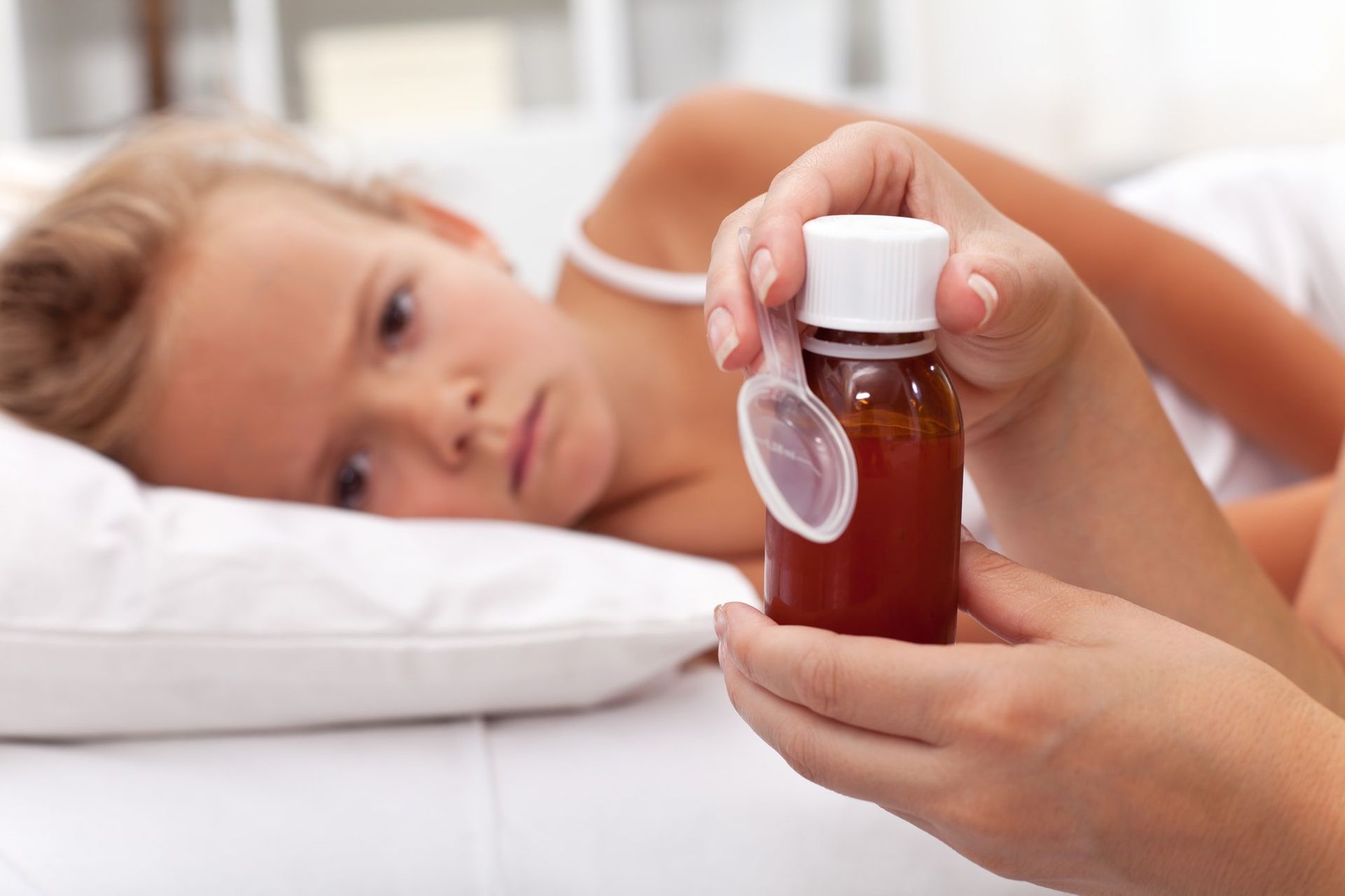 Sick child with medicine