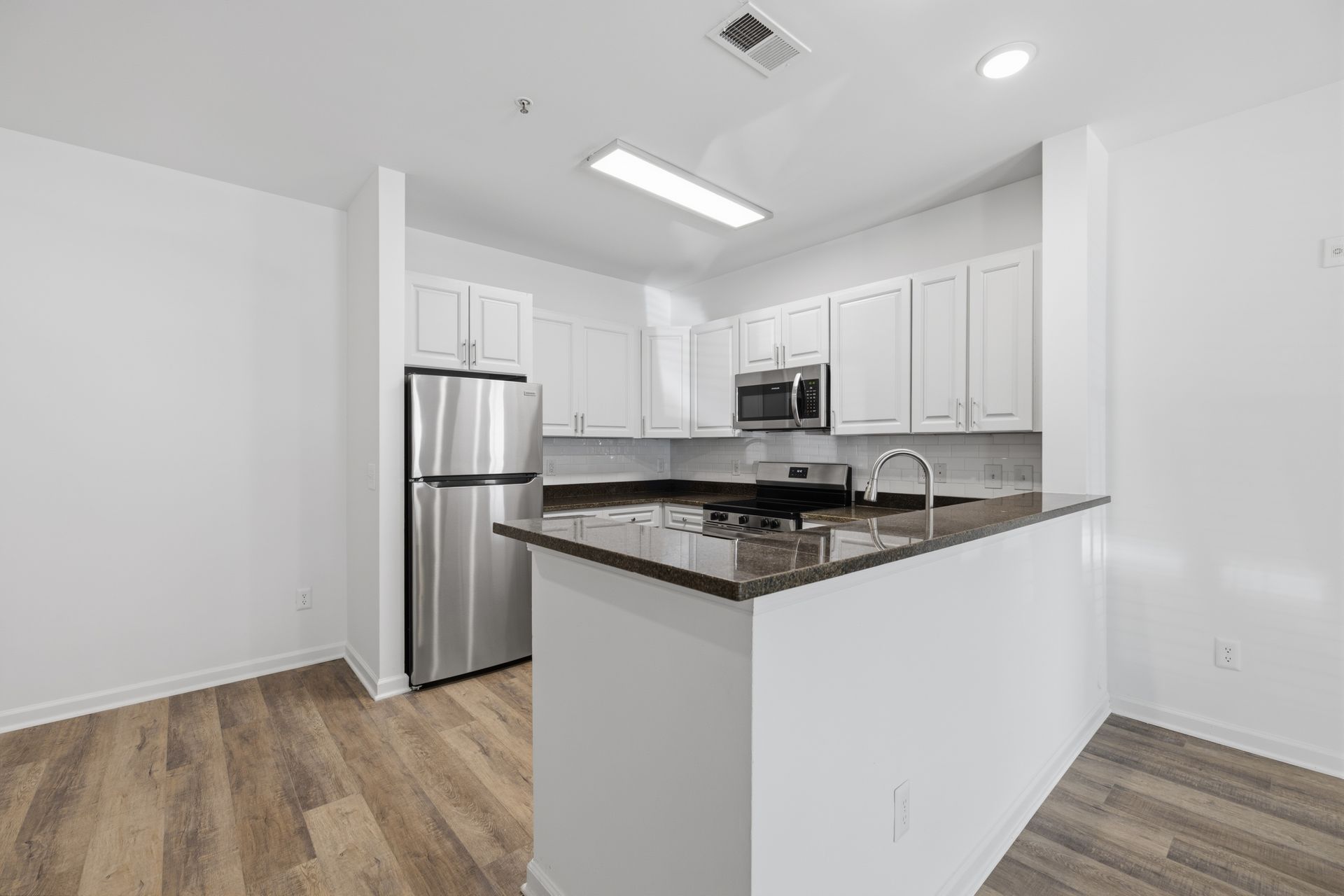 Kitchen with island bar.
