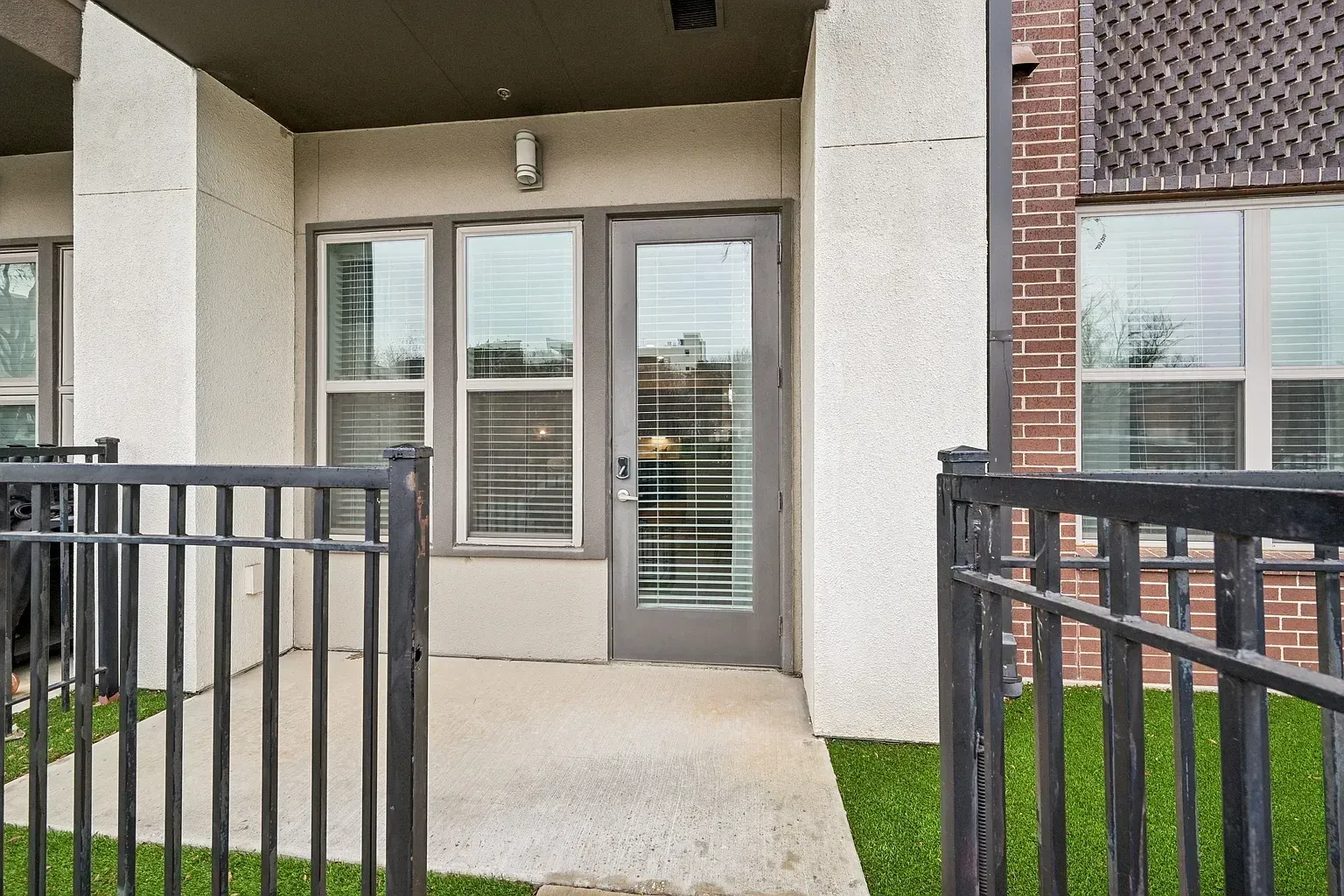 Balcony with glass door and windows