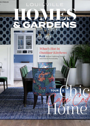 Cover of Louisville Homes & Gardens magazine featuring a dining room with blue patterned wallpaper and a dining set.
