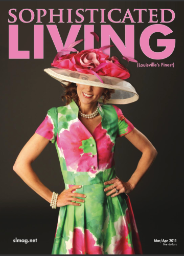 A person wears a colorful floral dress and a wide-brimmed pink hat on the cover of Sophisticated Living magazine.