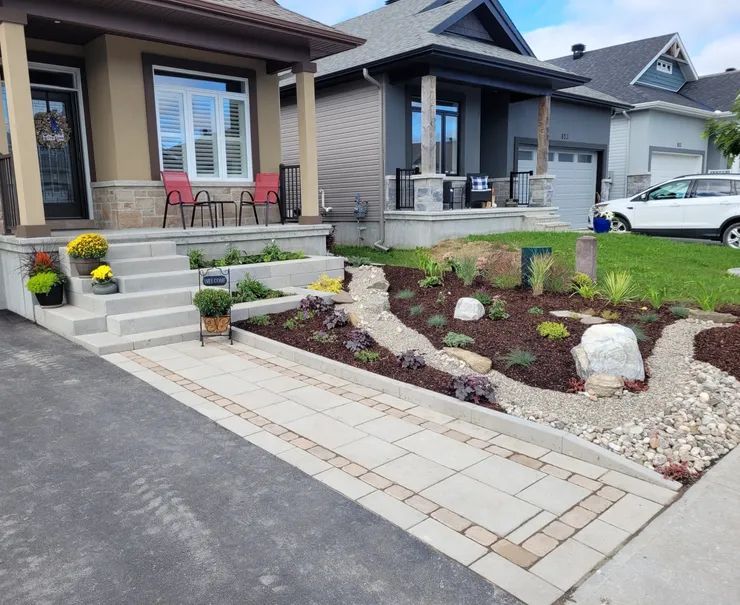 A house with a car parked in front of it.