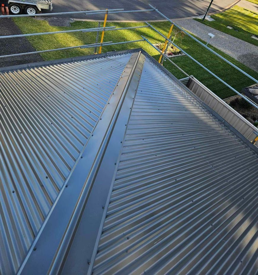 An Aerial View of a Metal Roof With Scaffolding on It โ Tim Leach Metal Roofing in Wauchope, NSW