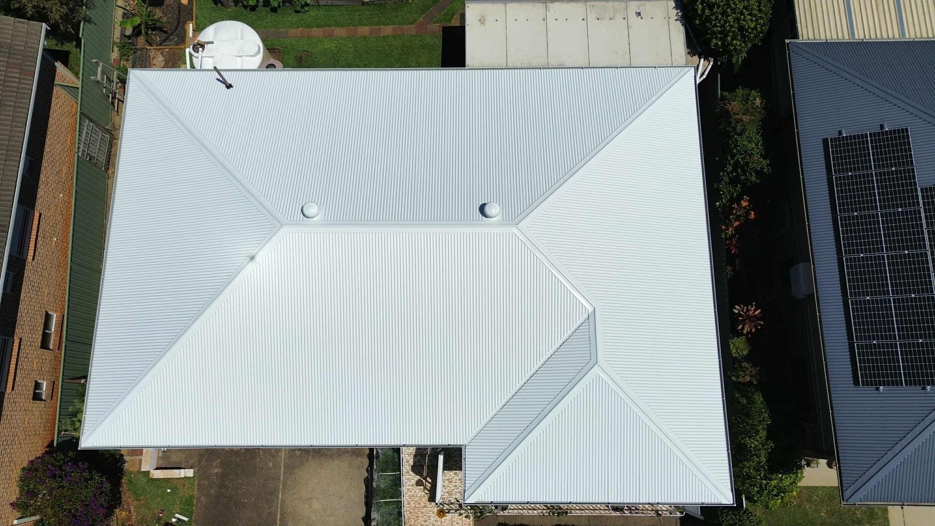 Overhead View of a House With a Silver Metal Roof — Tim Leach Metal Roofing in Wauchope, NSW