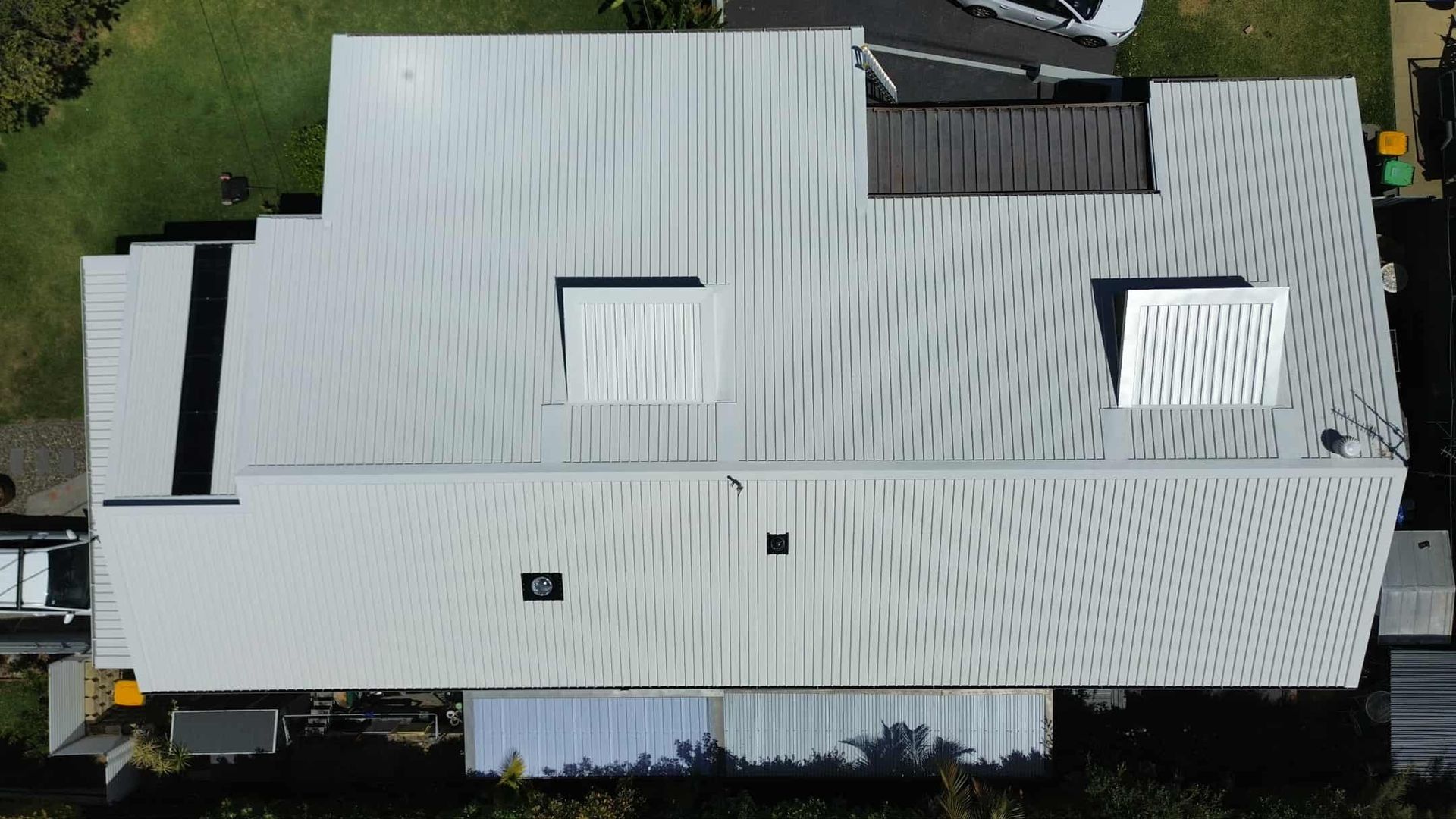 Overhead View of a Building With a Corrugated Silver Metal Roof — Tim Leach Metal Roofing in Wauchope, NSW