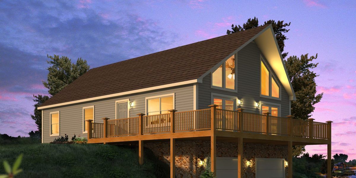A house with a large deck is lit up at night