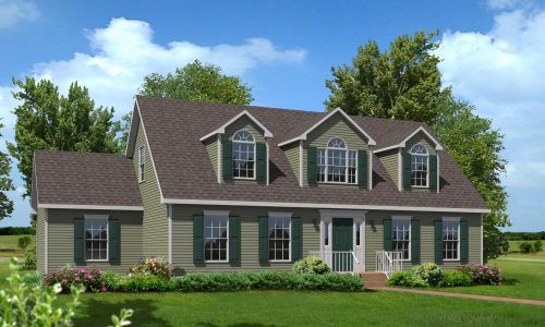 A house with a brown roof and green shutters