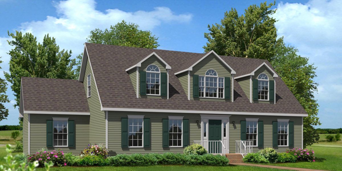 A house with a brown roof and green shutters