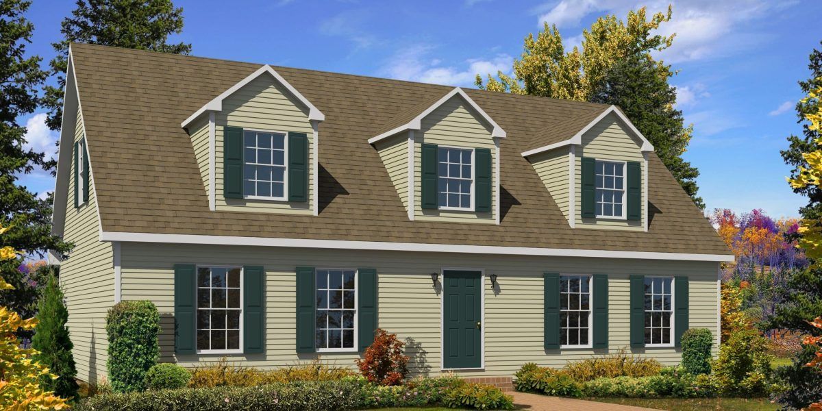 A house with a brown roof and green shutters