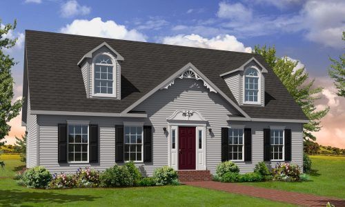 Gray suburban house with black shutters, red front door, and a manicured lawn under a blue sky