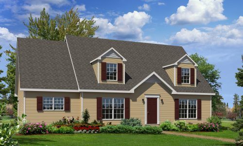Suburban brick house with dormer windows, dark roof, and landscaped front yard under a blue sky