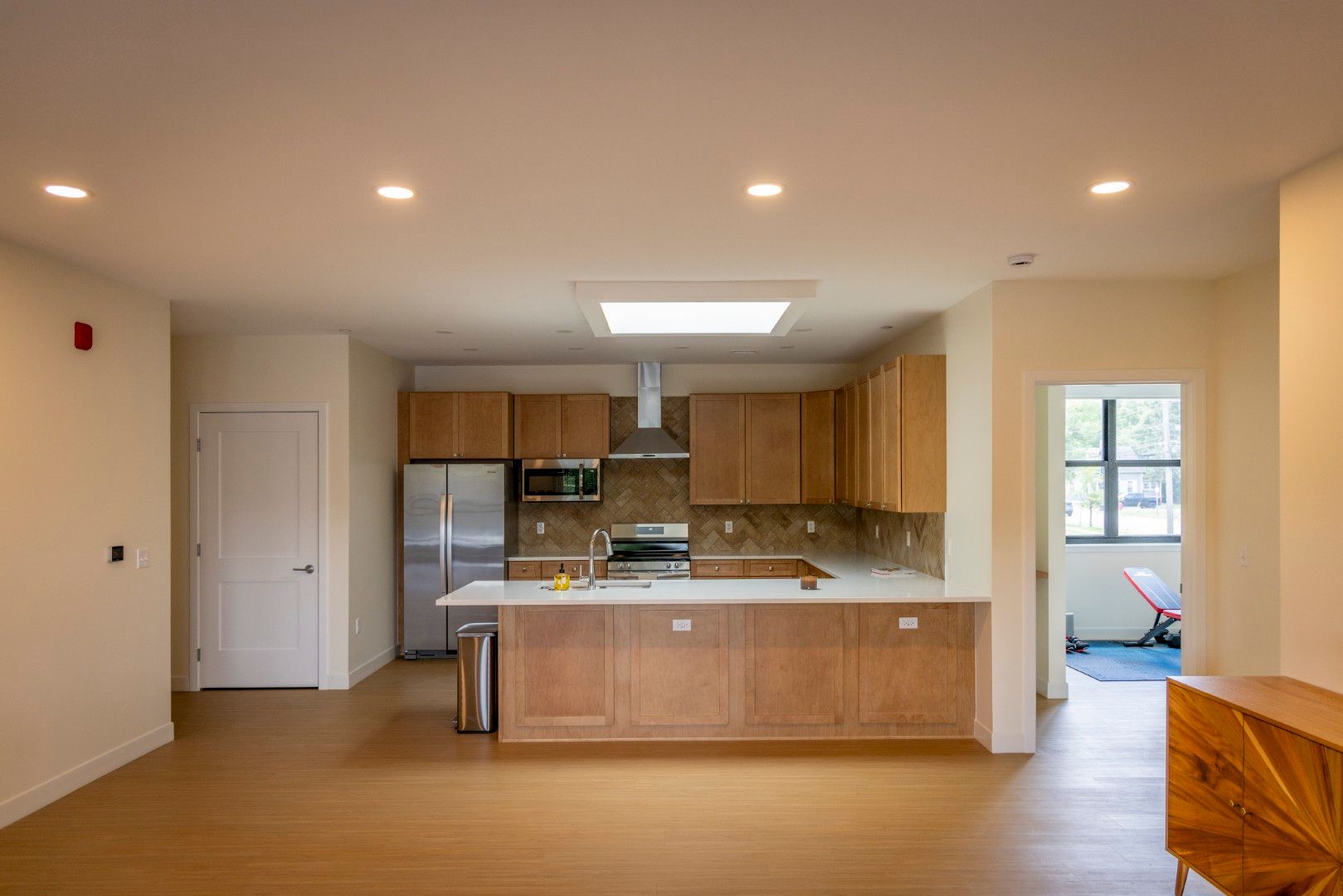 Kitchen photo of Mixed use development in Fenton, MI