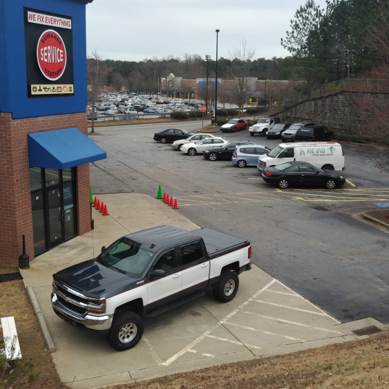 Parking in Front of Suwanee Service Station - Auto Repair in Suwanee