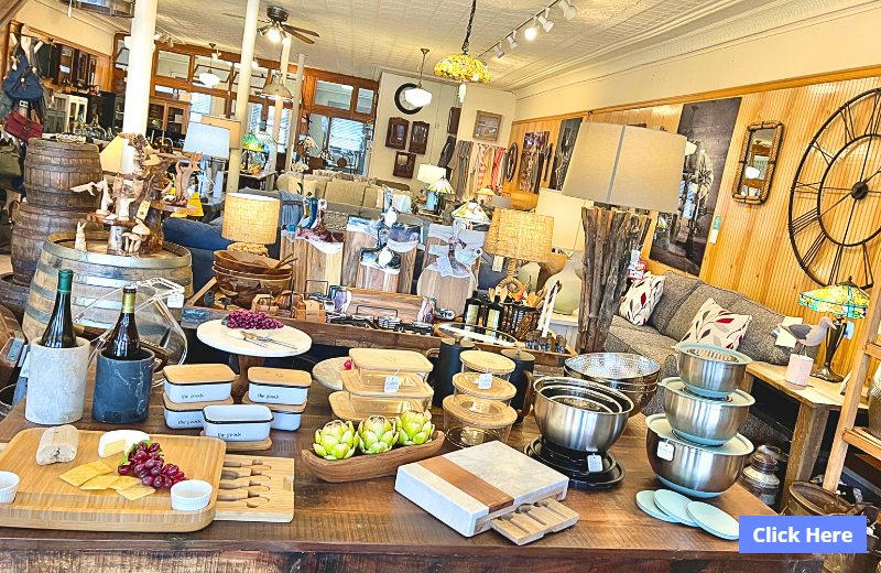 Interior of a retail store filled with home decor, kitchen items, and furniture.