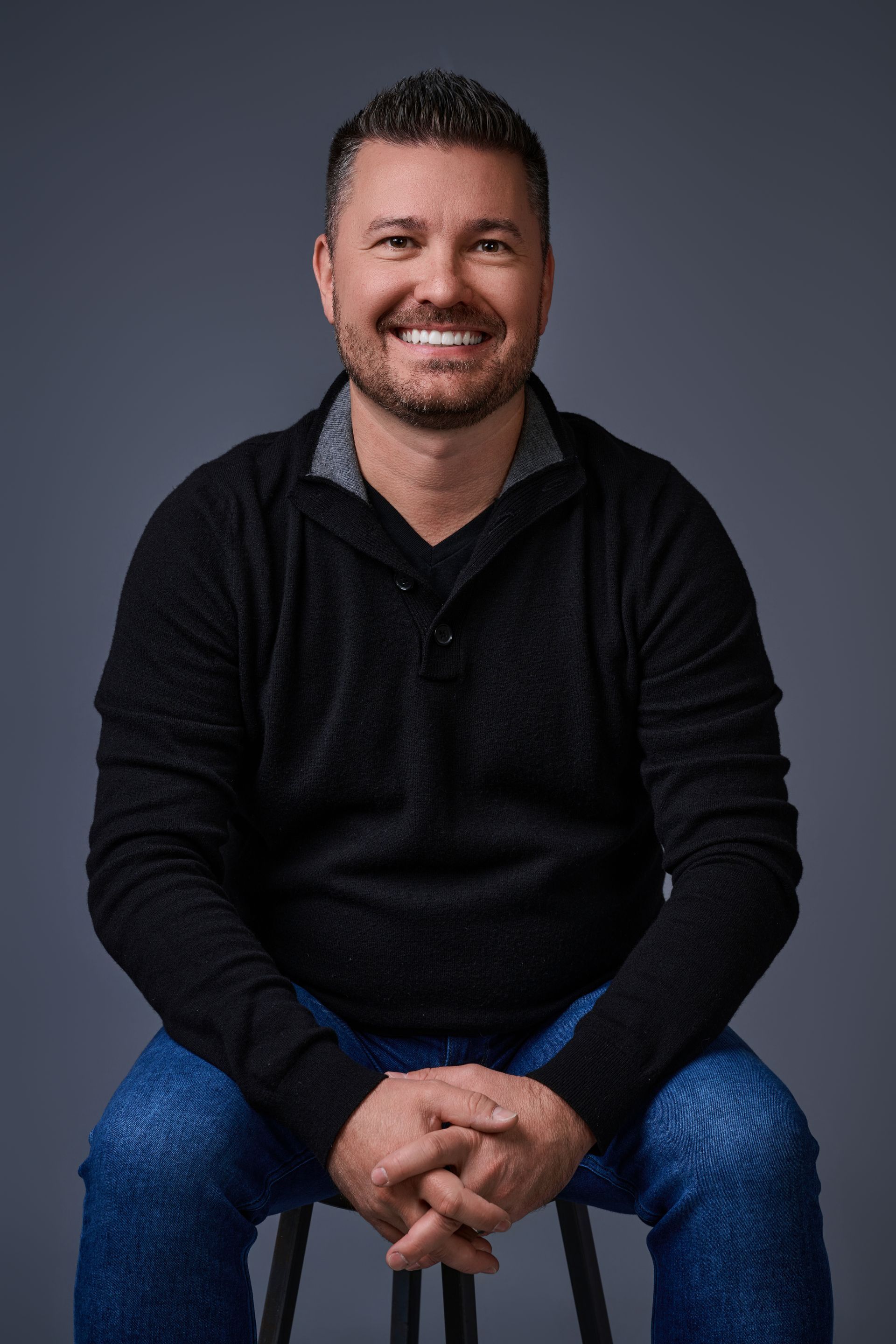 Headshot of Don Erik Wolff, founder of Wolff Construction, in a professional studio setting.