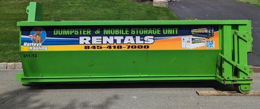 Green dumpsters with