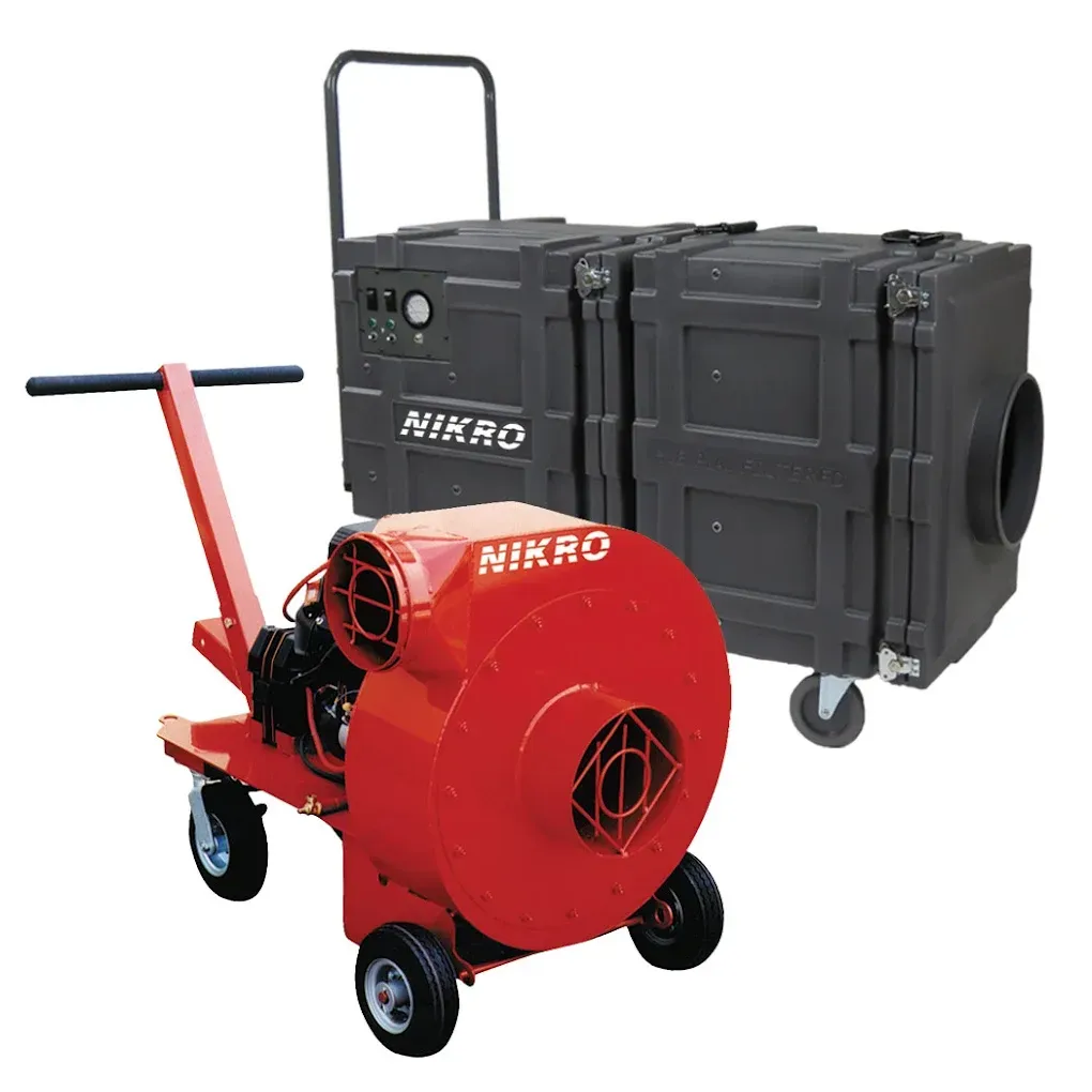 Red and black Nikro industrial blower with wheeled cart and large black ducting case