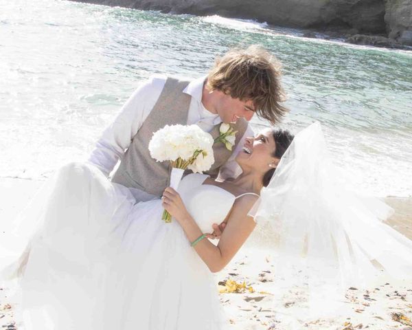 happy newly weds at the beach