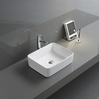 Modern gray bathroom vanity with a white square sink, chrome faucet, and a tilted digital display stand.