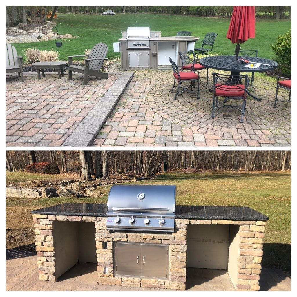 Backyard patio with paver seating area and built-in brick grill under a wooded backdrop.