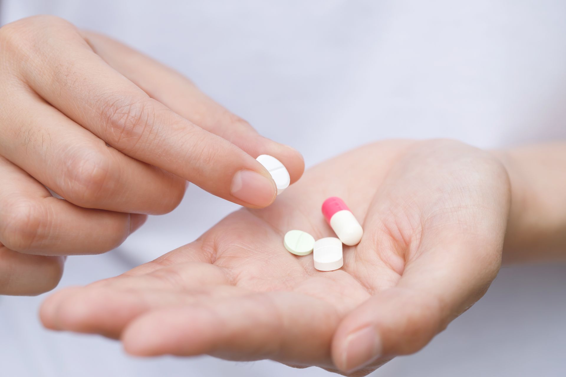 woman taking medication