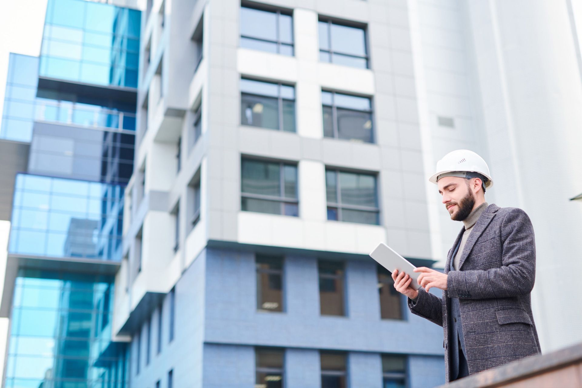 Commercial inspector reviewing building checklist