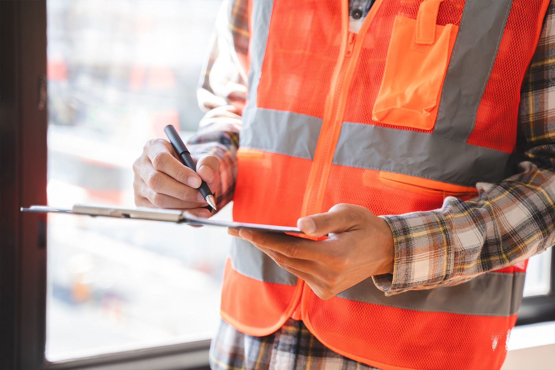Commercial inspection specialist evaluating building systems