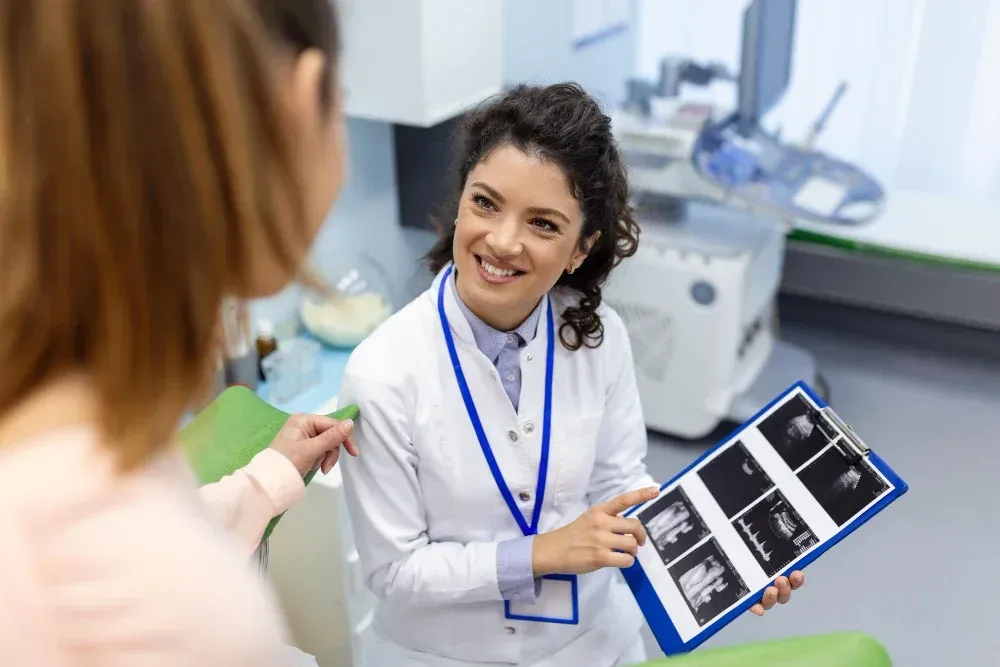 Fertility specialist explaining IVF process