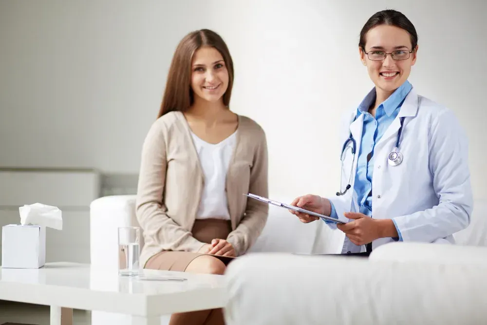 a patient with fertility specialist for needle free ivf