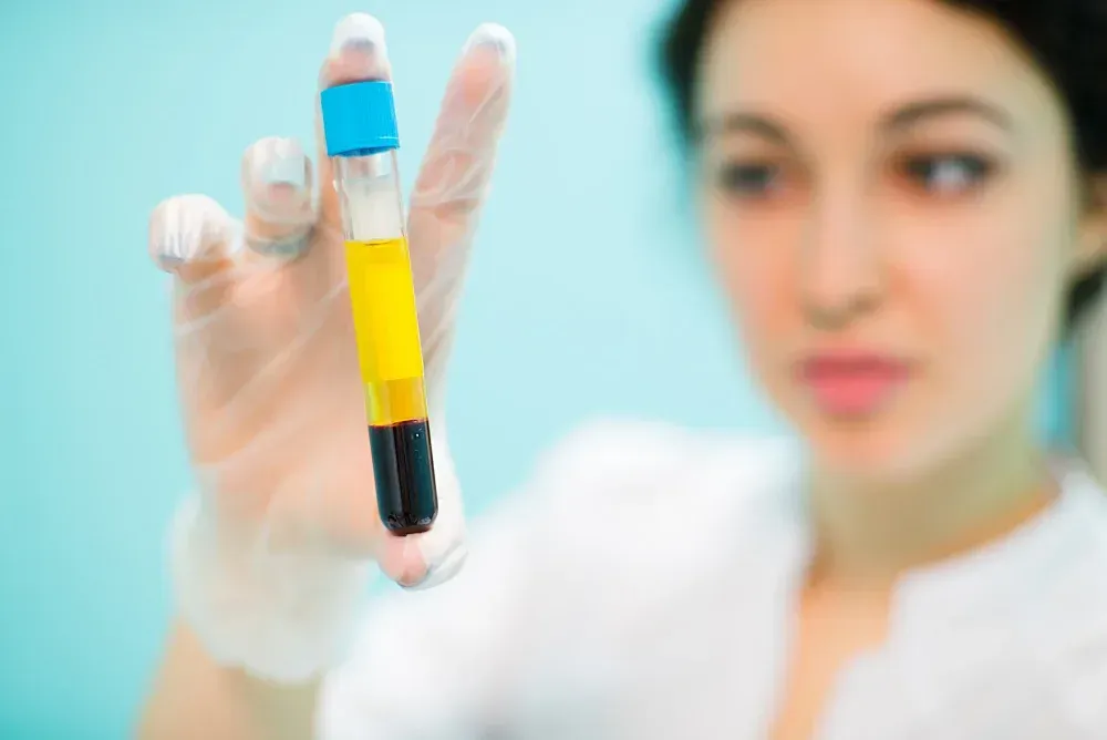 Expecting couple meeting with a fertility specialist at Precision IVF in Dallas