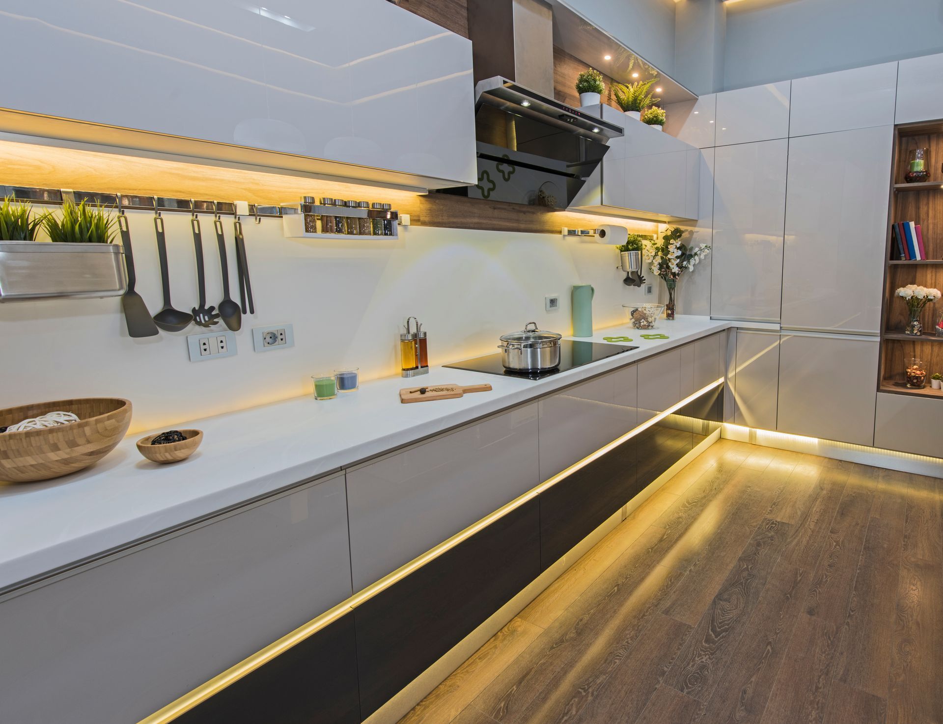 A modern kitchen in a house with LED lighting details, benefiting from an LED lighting subsidy.