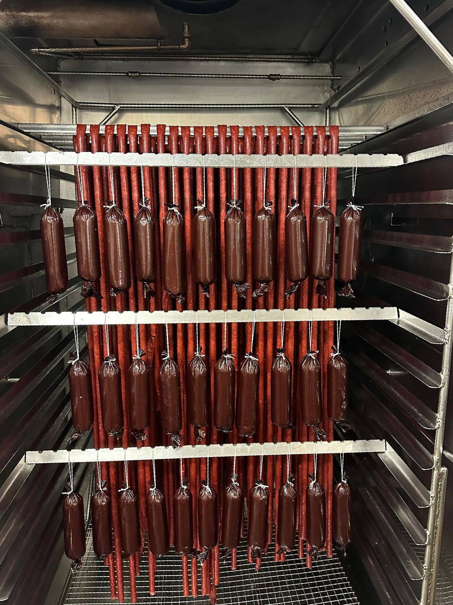 deer sticks hanging in cooker