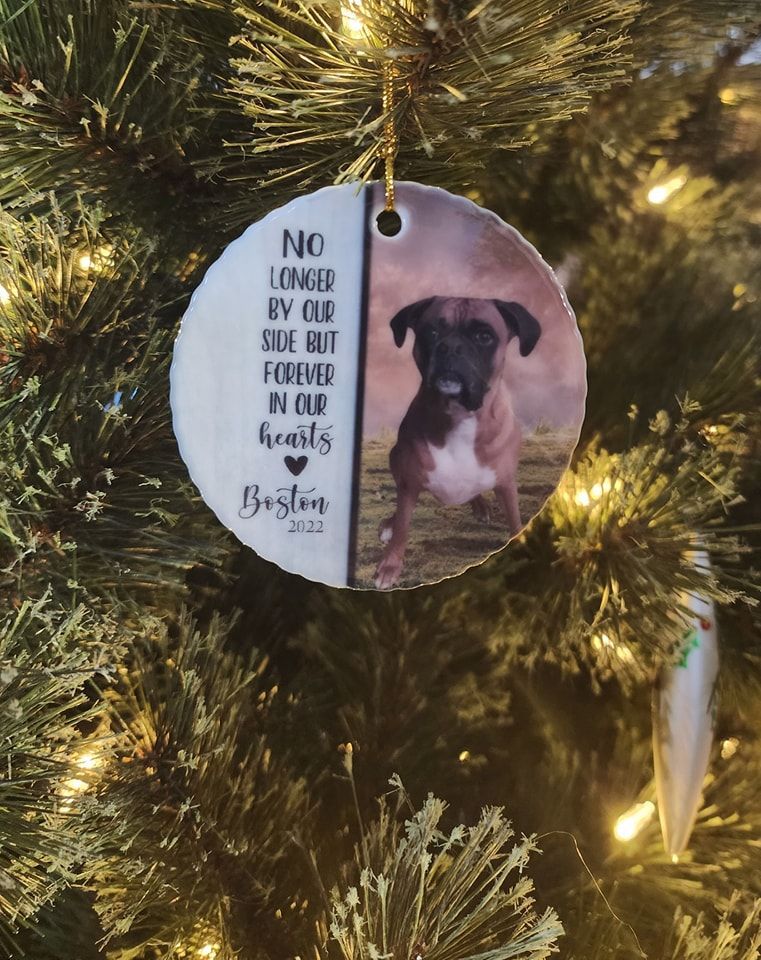 Christmas tree ornament with photo of dog, memorial text:
