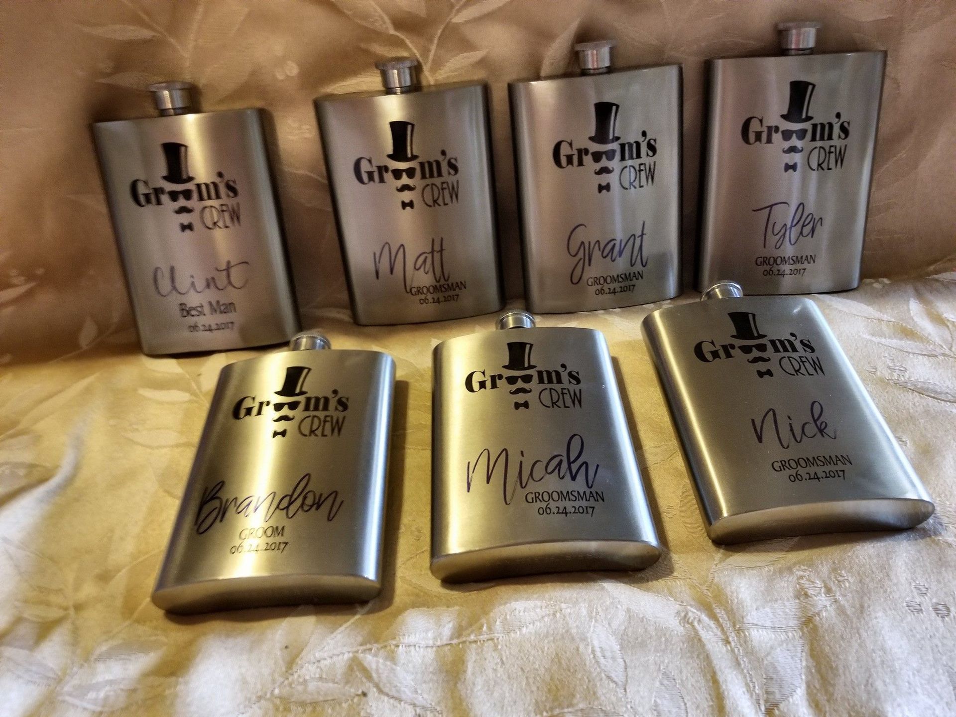 Seven silver flasks engraved