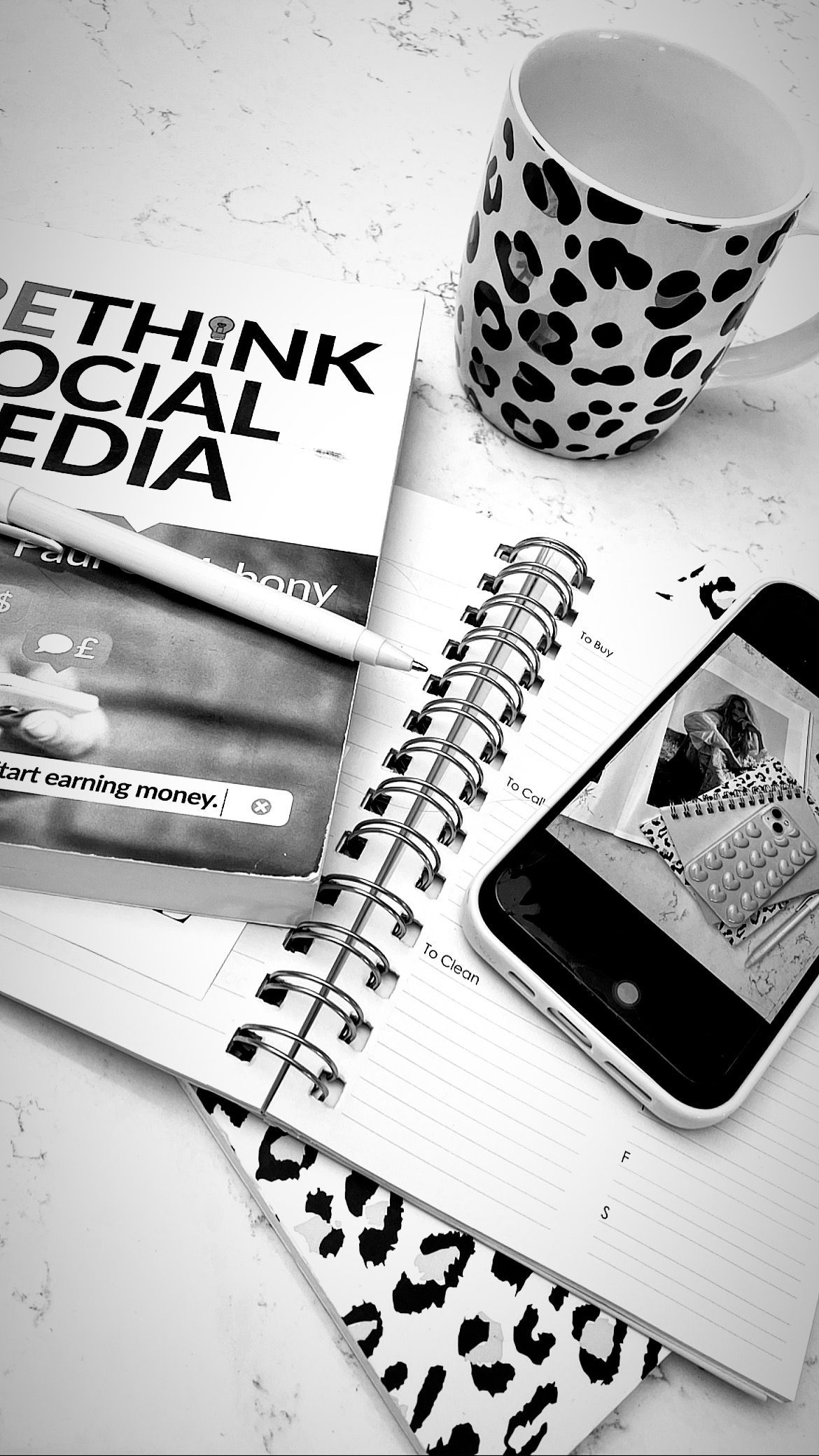 social media book and leopard print mug
