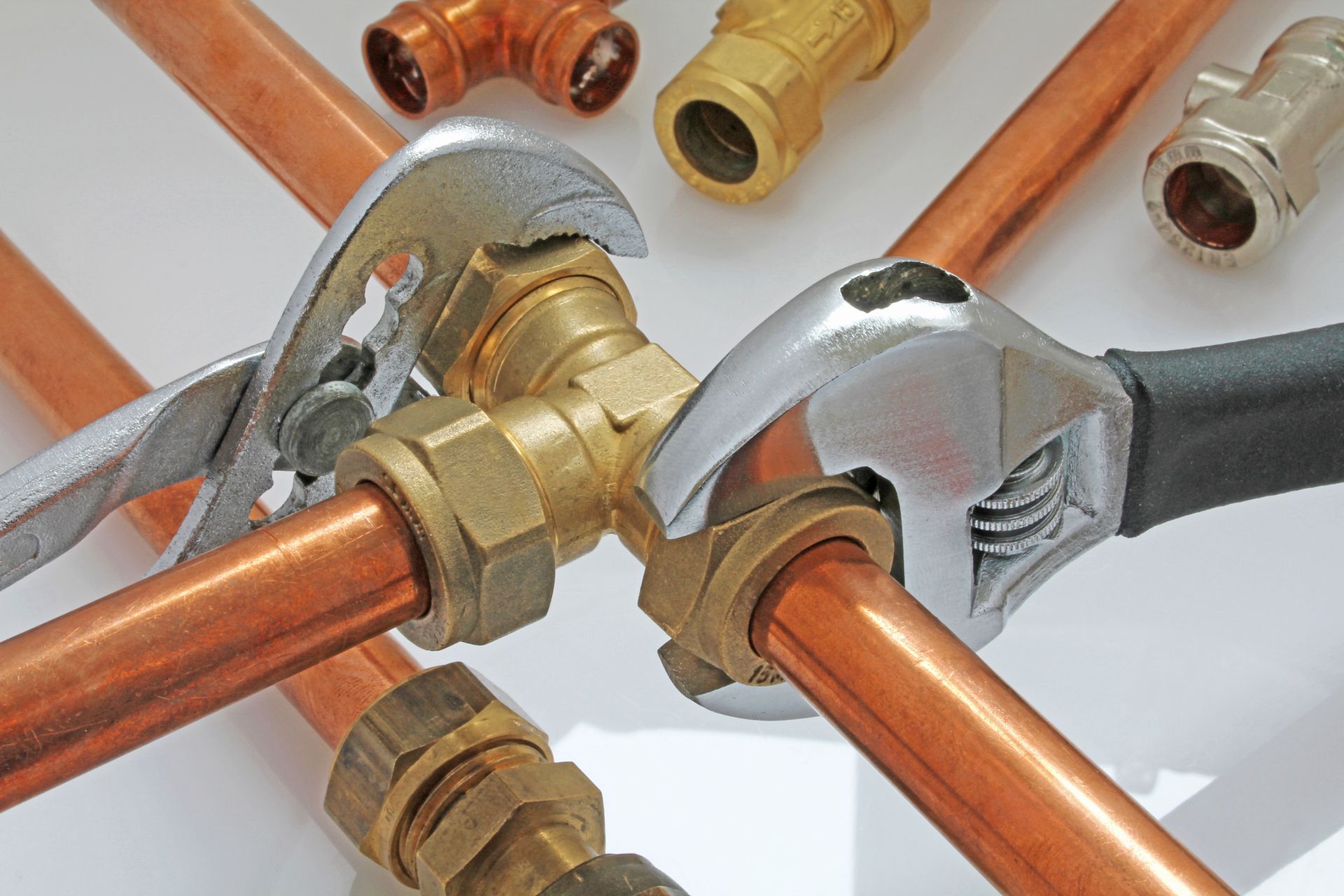 Plumber tightening up pipework — Ringwood, VIC — Dickson Plumbing