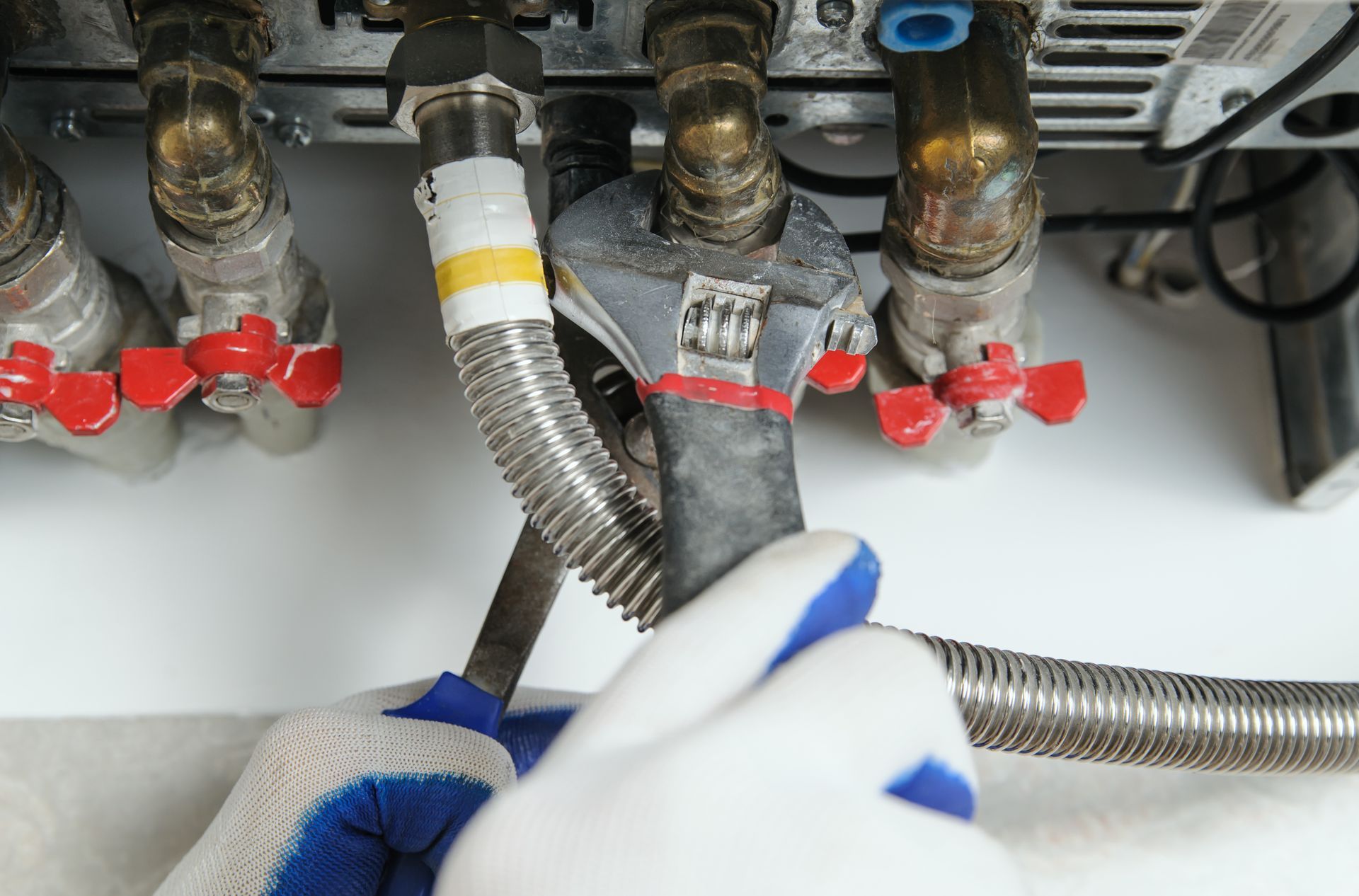 Plumber attaches to pipe gas boiler — Ringwood, VIC — Dickson Plumbing