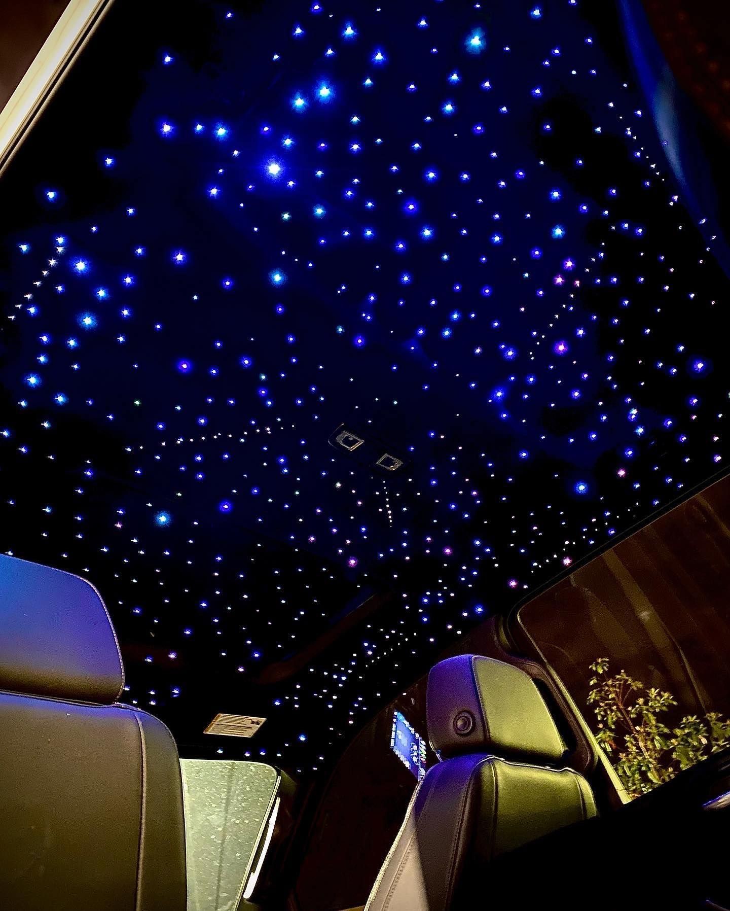 Blue fiber optic star headliner installation by Starlit Auto