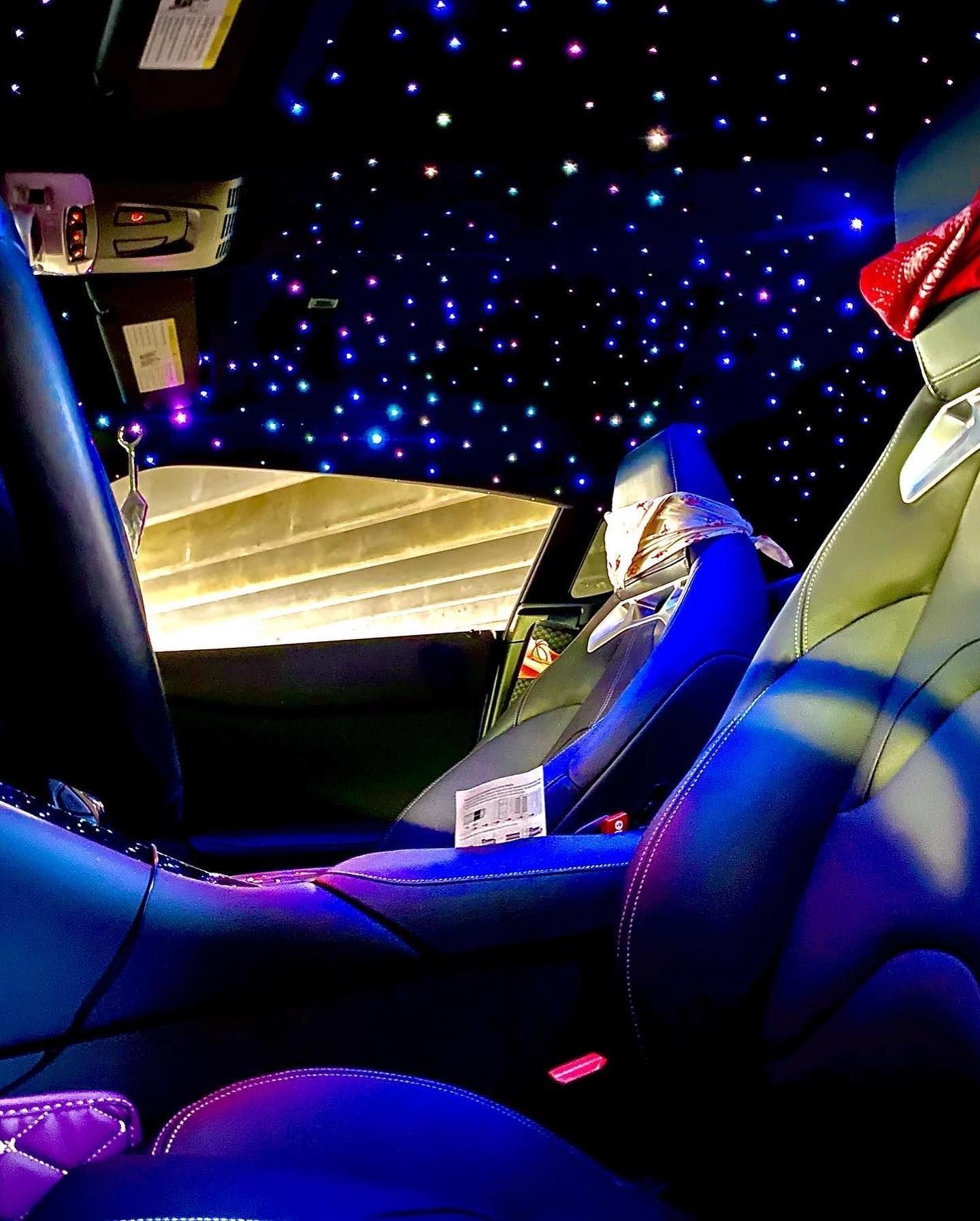 Custom blue star headliner with multicolor fiber optic lighting