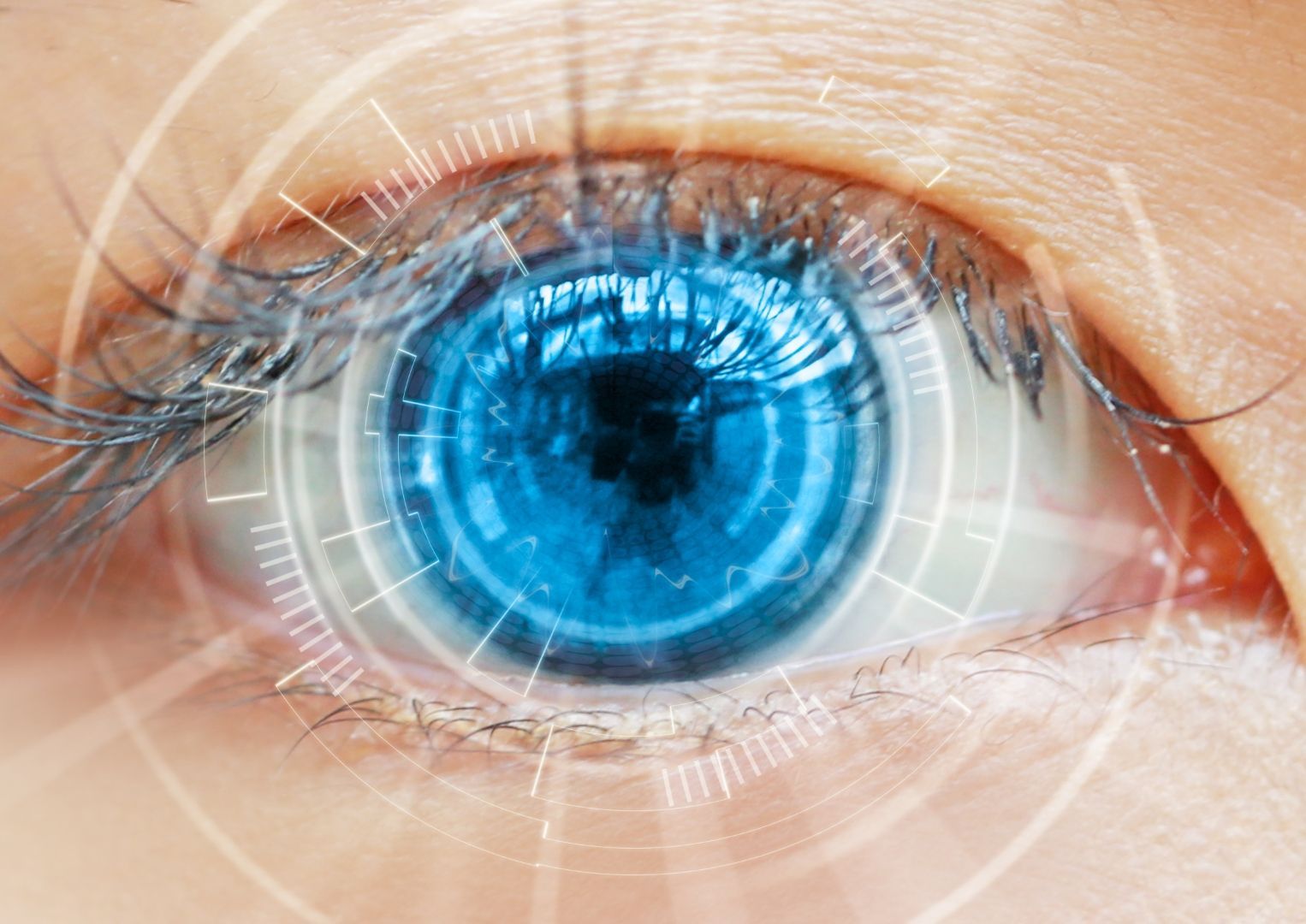 Blue eye with digital interface overlay, indicating biometric scanning or augmented reality.
