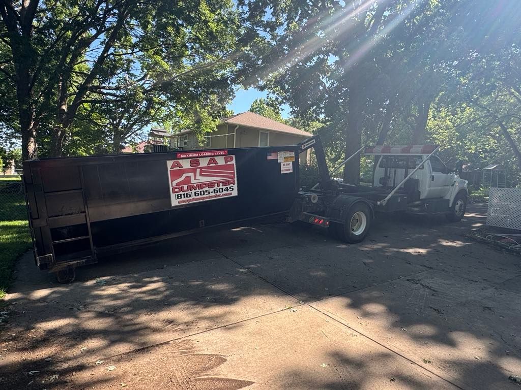delivering a 20 yard roll off dumpster rental belton mo