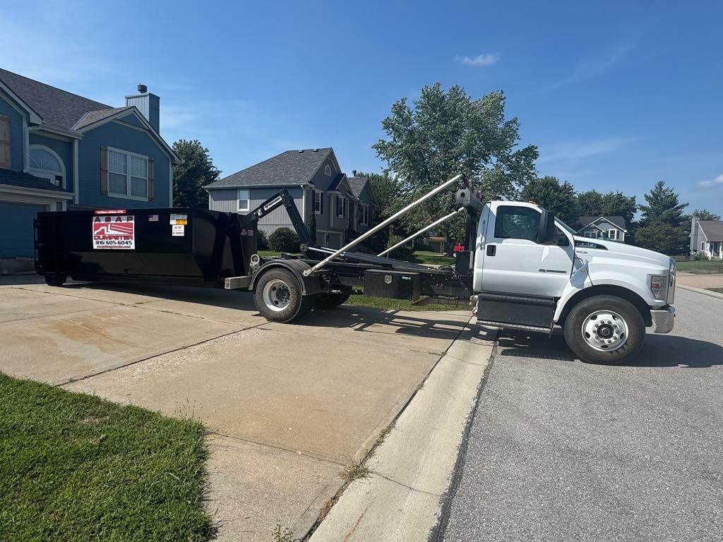 ASAP Dumpster roll off container placed in Overland Park residential driveway.