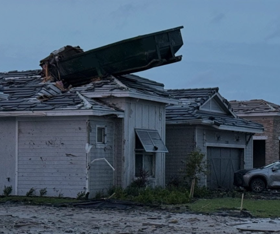 20 yard dumpster on roof of house in kc