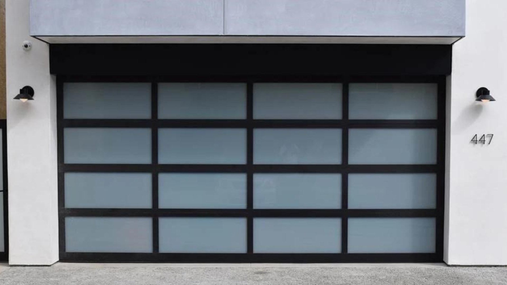 A black glass garage door