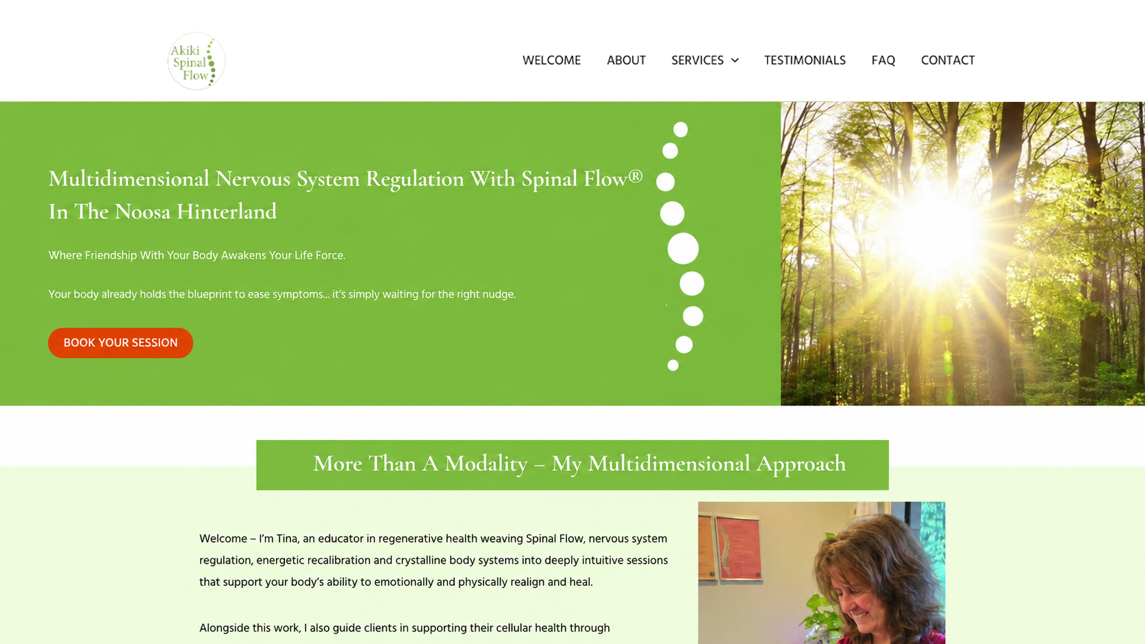 Green website homepage with sunlit forest hero image and a person reading in a content section