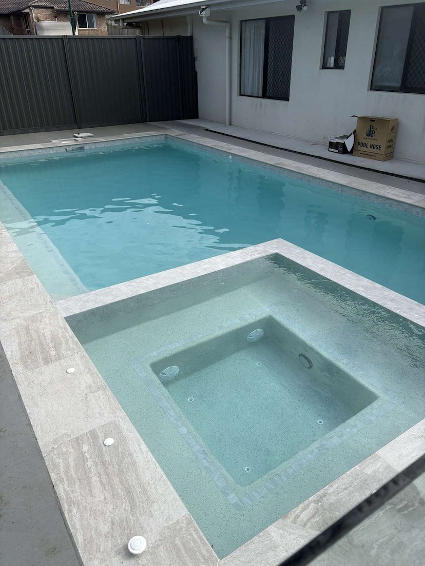 A concrete swimming pool with a shallow end in Labrador