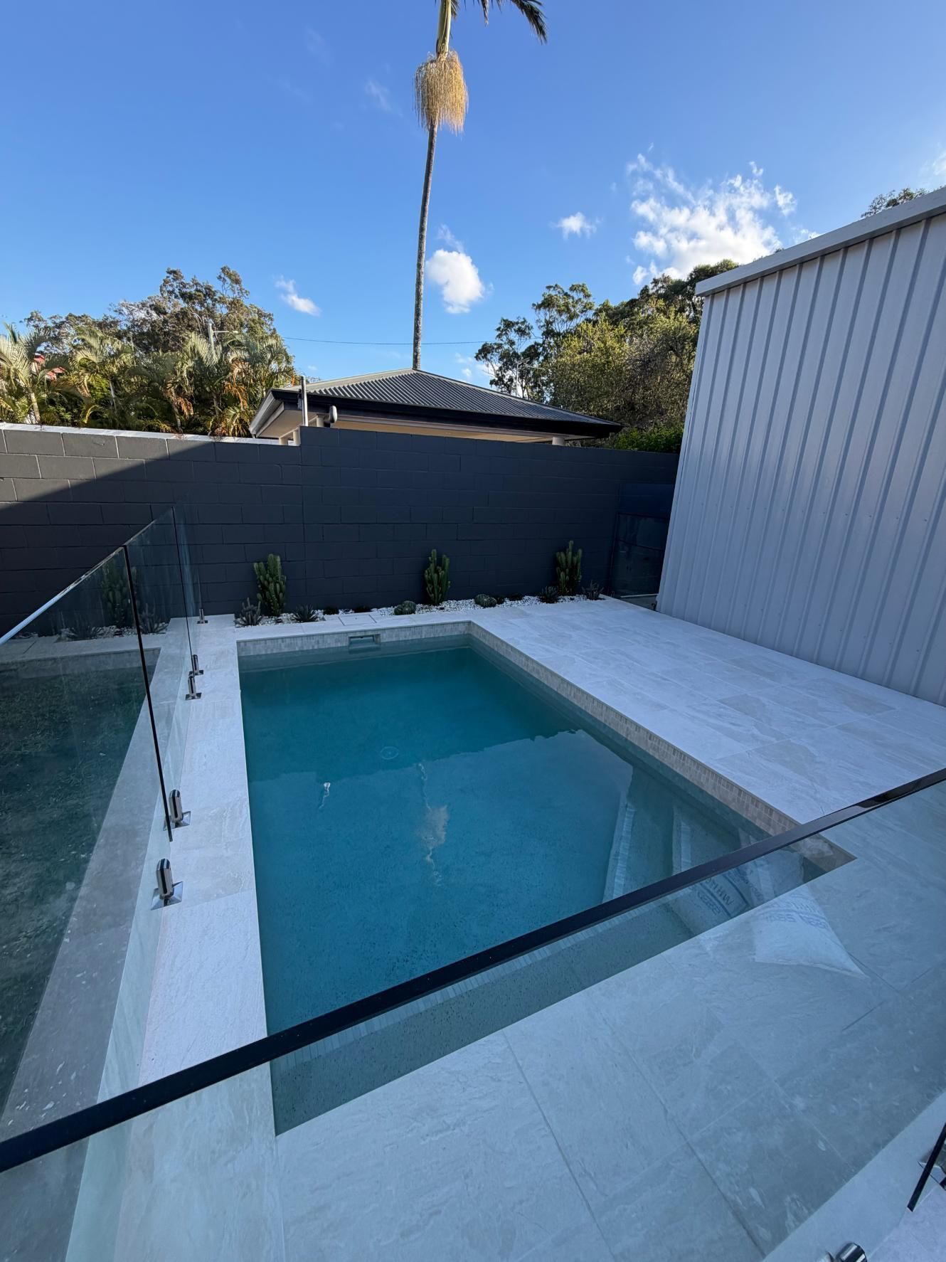 A tiled pool surround