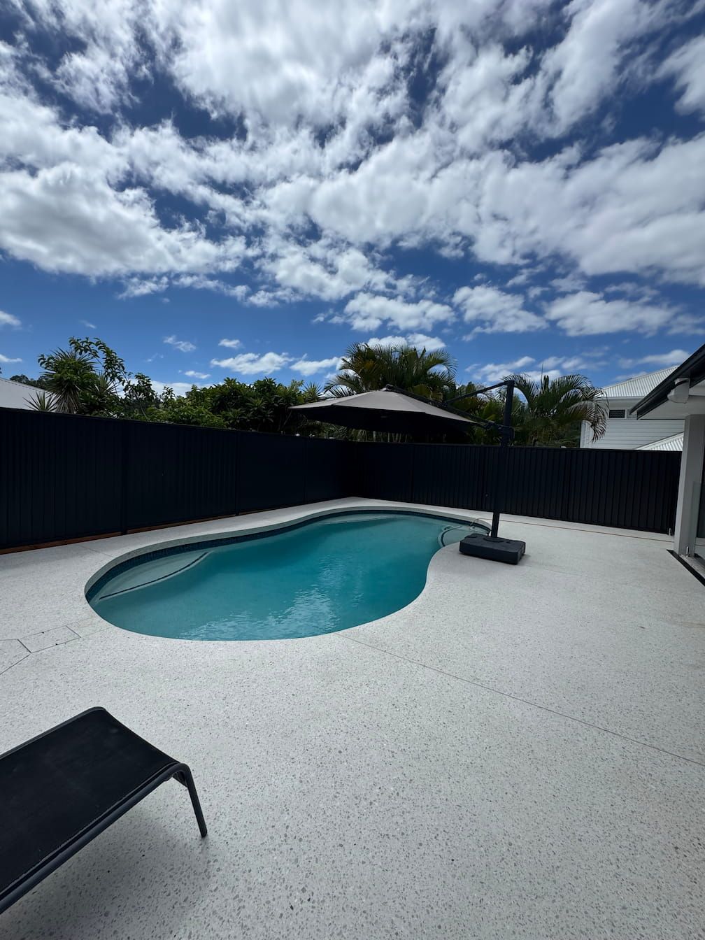 A custom concrete swimming pool in Ashmore